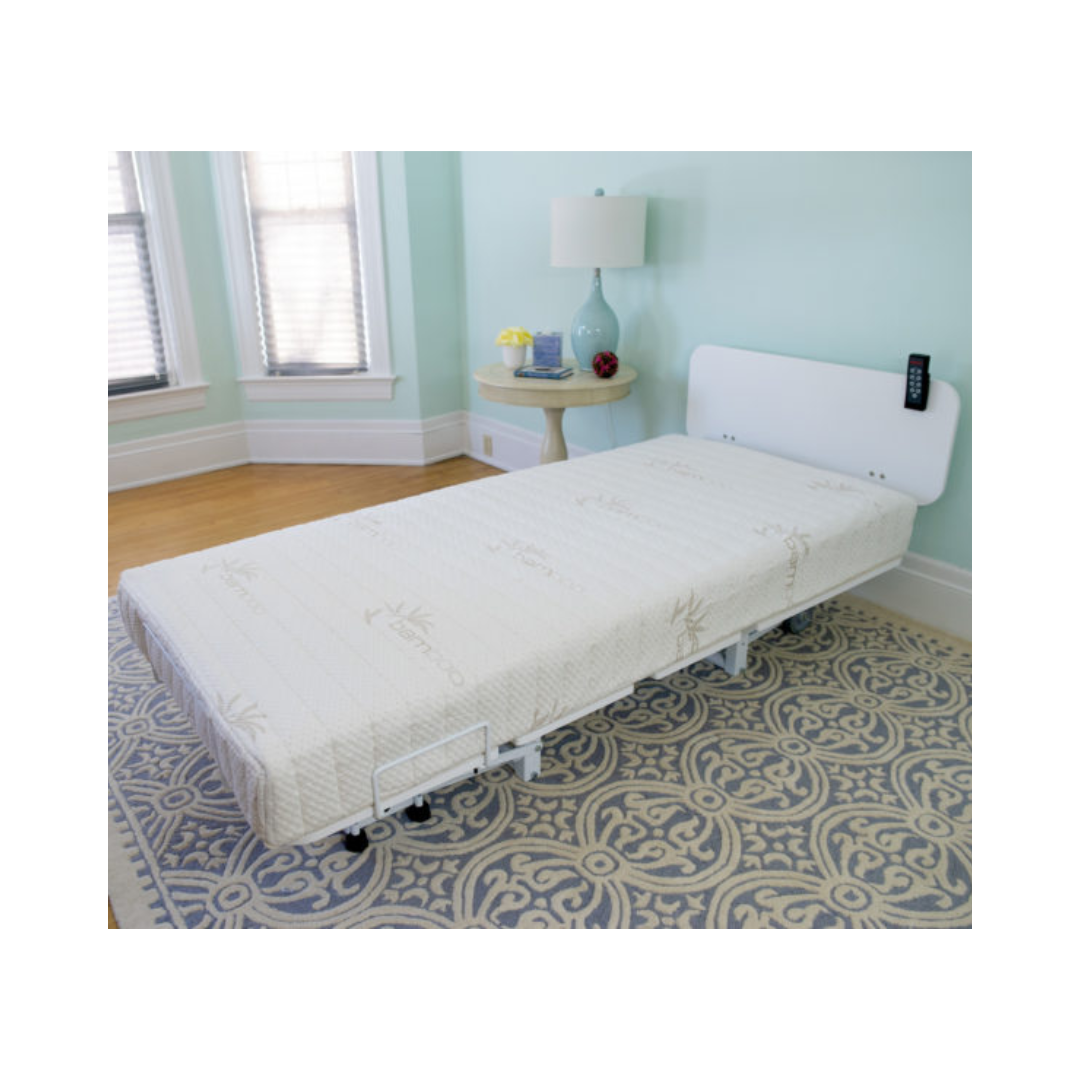 Transfer Master adjustable bed footboard with white padded headrest and beige mattress in bedroom