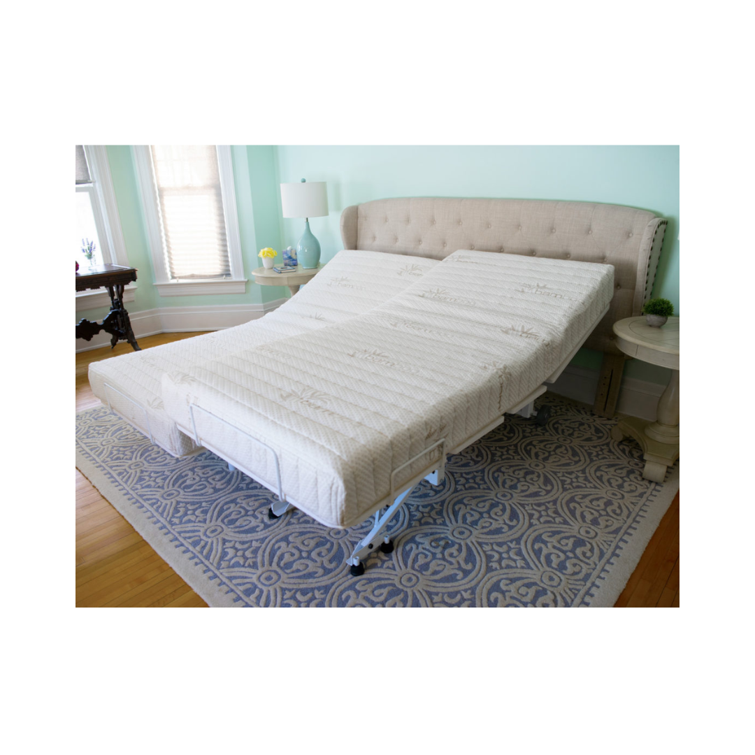 Transfer Master New Valiant Adjustable Hospital Bed with split mattress sections in a bedroom setting